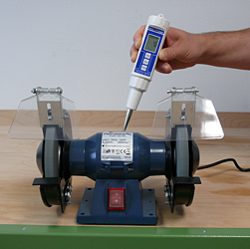 Here you will see a vibration meter testing a machine.