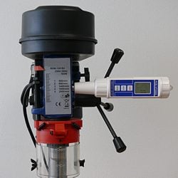 This image shows the vibration meter testing a fixing drilling machine