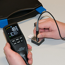 Paint gauge self-calibration with external sensor probe