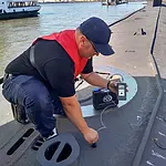 Thickness Meter during the application on a submarine.